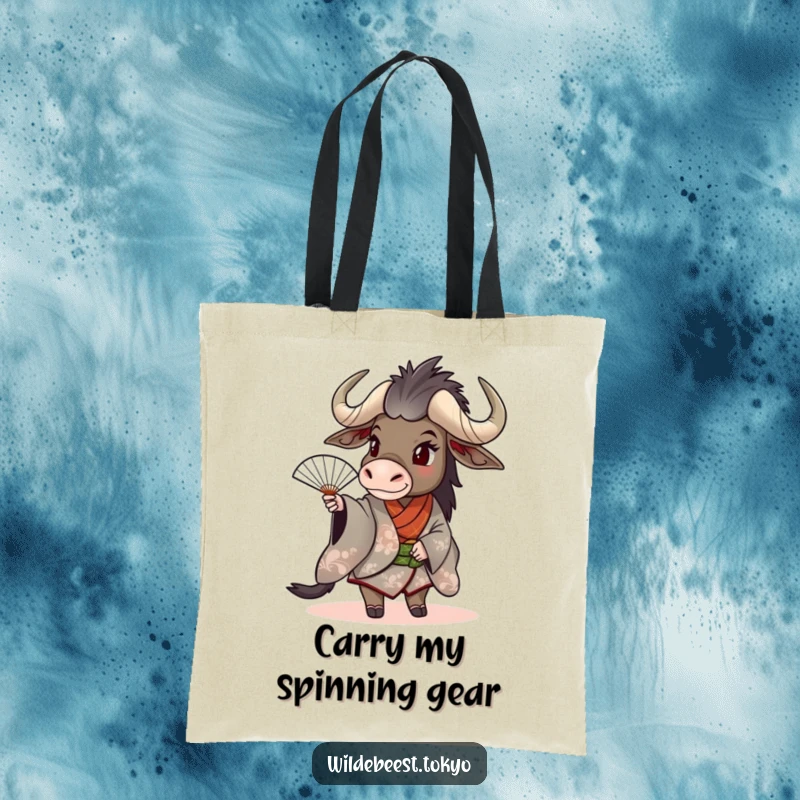 Funny wildebeest in a stylish kimono playfully spinning a fan, perfect for carrying essentials on this tote bag.